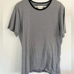 Black and white striped shirt size XL fits more like L